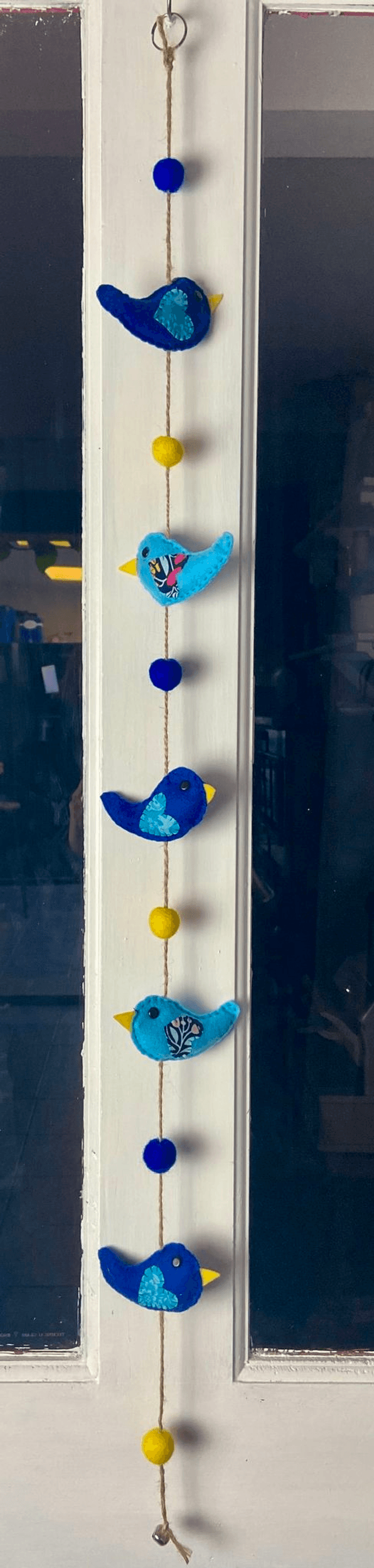 Hanging blue bird decoration.