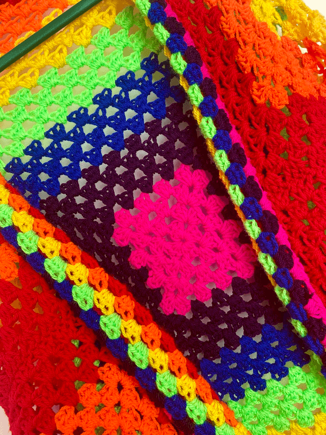 Rainbow shrug style cardigan.