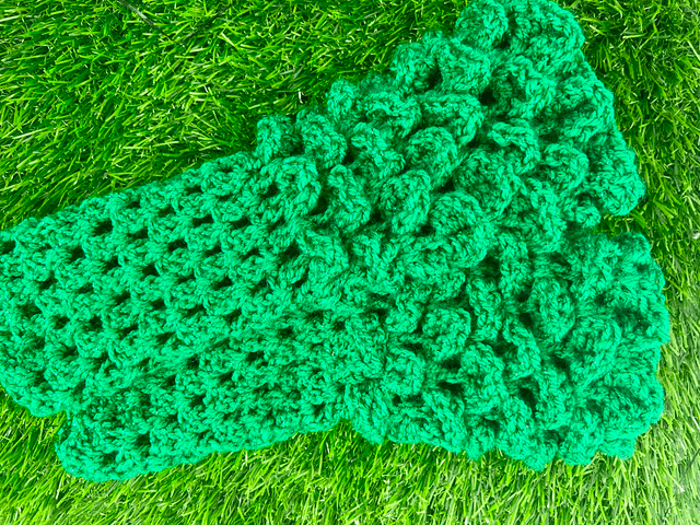 Crochet dragon scale wrist warmers.