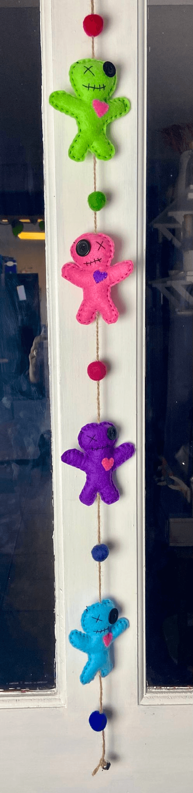 Hanging voodoo doll decoration.