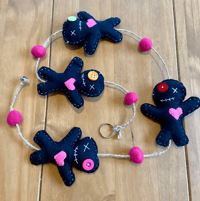 Hanging voodoo doll decoration.